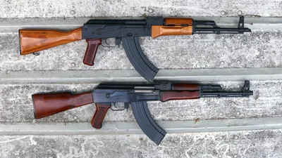 Hand Holding AK-47 Machine Gun Stock Photo - Image of weapon, metal:  42333866