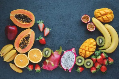 несколько красочных тропических фруктов показаны на столе, экзотические  фрукты картинки и названия фон картинки и Фото для бесплатной загрузки