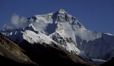 Why did Mount Everest's height change?