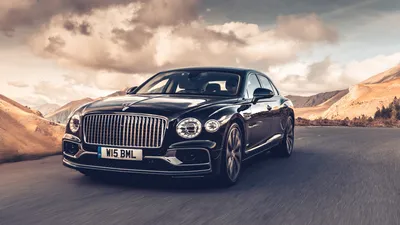 Обои на рабочий стол Bentley Continental GT на фоне заснеженных гор и неба,  обои для рабочего стола, скачать обои, обои бесплатно