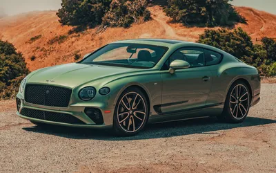 Обои на рабочий стол Двухдверное 4-местное купе Bentley Continental GT на  улице ночного города, обои для рабочего стола, скачать обои, обои бесплатно