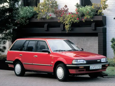 Classic Elegant Red Old Mazda 323 Parked Editorial Stock Photo - Image of  cooler, historic: 161609513