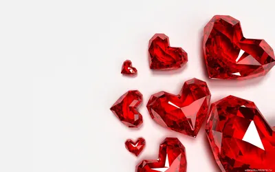 Романтические красные сердечки разных размеров - обои на рабочий стол