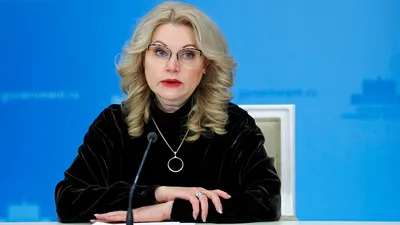 Медсестра инфекционного госпиталя вышла на работу в купальнике и прозрачном  защитном костюме - и другие события дня Спектр