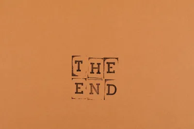 The end neon sign on brick wall background. Stock-Vektorgrafik | Adobe Stock